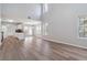 Bright living space boasts an open floor plan, wood floors, and plenty of natural light at 4284 Hathaway Nw Ct, Kennesaw, GA 30144
