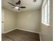 Bedroom featuring a new ceiling fan and a window at 1995 Northerly Way, Stone Mountain, GA 30088