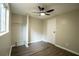 Nice bedroom with new ceiling fan, closet, and wood-look floors at 1995 Northerly Way, Stone Mountain, GA 30088