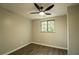 Bright bedroom with new fan, window, and neutral paint at 1995 Northerly Way, Stone Mountain, GA 30088