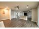 Open-concept living space boasting recessed lights, ceiling fans, and modern hard surface flooring at 1995 Northerly Way, Stone Mountain, GA 30088