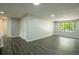 Inviting living room with natural light, recessed lighting, and durable hard surface floors at 1995 Northerly Way, Stone Mountain, GA 30088