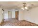 Bedroom featuring carpeted floor, ceiling fan, and closet with neutral walls at 2762 Zingara Ne Rd, Conyers, GA 30012