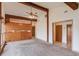 Bright living room featuring open beams and wood accent panels at 2762 Zingara Ne Rd, Conyers, GA 30012