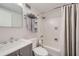 Bathroom featuring a shower with curtain and a gray vanity at 2965 Pharr Court South Nw # 110, Atlanta, GA 30305