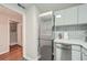 Bright kitchen with stainless steel refrigerator and white subway tile backsplash at 2965 Pharr Court South Nw # 110, Atlanta, GA 30305