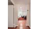 View of the living room from the hallway featuring hardwood floors and modern décor at 2965 Pharr Court South Nw # 110, Atlanta, GA 30305