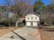 Charming two-story home with two-car garage and traditional architectural style at 4502 Cherie Glen Trl, Stone Mountain, GA 30083