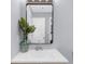 Bathroom vanity features a large mirror, modern faucet, gray walls and decorative plant at 1115 Mcgill Park Ne Ave, Atlanta, GA 30312