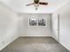 Bright bedroom with natural light, neutral tones and ceiling fan at 1742 Mural Dr, Morrow, GA 30260