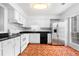 Bright kitchen featuring white appliances, white cabinets, subway tile backsplash and a large window at 3177 Shadow Walk Ln, Tucker, GA 30084