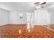 Inviting living room with tile floors, neutral paint, ceiling fan and an abundance of light at 3177 Shadow Walk Ln, Tucker, GA 30084