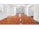 Bright living room with decorative wood trim, an open floor plan, and distinctive tile flooring at 3177 Shadow Walk Ln, Tucker, GA 30084