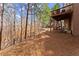 Spacious backyard featuring trees, foliage, and back deck at 403 Mill Xing, Canton, GA 30114