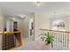 Bright foyer features open staircase and a decorative rug at 403 Mill Xing, Canton, GA 30114