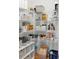 Walk-in pantry with metal shelving for optimized food storage at 403 Mill Xing, Canton, GA 30114