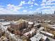 Scenic aerial shot showcases neighborhood's lush greenery, city views, and close proximity to shopping and dining at 746 N Highland Ne Ave # 11, Atlanta, GA 30306