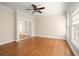 Light bedroom with hardwood floors, ceiling fan and double mirrored closet at 746 N Highland Ne Ave # 11, Atlanta, GA 30306