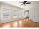 Bright, open bedroom featuring large windows and hardwood floors at 746 N Highland Ne Ave # 11, Atlanta, GA 30306