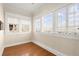 Bright living room with hardwood floors and large windows at 746 N Highland Ne Ave # 11, Atlanta, GA 30306