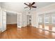 Sunlit living room with hardwood floors, neutral paint and open layout at 746 N Highland Ne Ave # 11, Atlanta, GA 30306