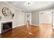 Spacious living room featuring hardwood floors and a cozy fireplace at 746 N Highland Ne Ave # 11, Atlanta, GA 30306