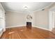 Cozy living room with a decorative fireplace and hardwood floors at 746 N Highland Ne Ave # 11, Atlanta, GA 30306