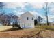 Back view of home with nice, flat backyard and new fence at 898 Center Hill Nw Ave, Atlanta, GA 30318