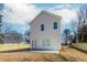 Back view of home with nice, flat backyard and new fence at 898 Center Hill Nw Ave, Atlanta, GA 30318