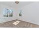 Bedroom with carpet, two windows overlooking the trees, white walls, and white trim at 898 Center Hill Nw Ave, Atlanta, GA 30318