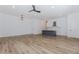 Open concept living room with a view of the kitchen and light hardwood floors at 898 Center Hill Nw Ave, Atlanta, GA 30318