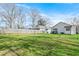 Expansive backyard features a lush lawn and privacy fence, offering ample space for outdoor activities and relaxation at 907 Oakhill Sw Ave, Atlanta, GA 30310