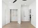 Bright bedroom featuring a closet and a door that leads to the house's living room at 907 Oakhill Sw Ave, Atlanta, GA 30310