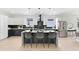 Modern kitchen featuring a large island, stainless steel appliances, and pendant lighting at 907 Oakhill Sw Ave, Atlanta, GA 30310