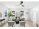 Bright living room with modern decor, sleek ceiling fan, and stylish furniture at 907 Oakhill Sw Ave, Atlanta, GA 30310