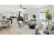 Open-concept living space with modern kitchen, sleek appliances, and dining area at 907 Oakhill Sw Ave, Atlanta, GA 30310