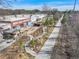 Aerial shot of an outdoor space featuring seating areas, landscaping, and artistic murals at 907 Oakhill Sw Ave, Atlanta, GA 30310