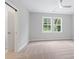 Bright bedroom with carpeting, a ceiling fan and windows providing ample natural light at 1324 Parc Bench Rd, Atlanta, GA 30316
