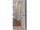 Open hallway with light gray walls, white trim, and vinyl flooring at 1324 Parc Bench Rd, Atlanta, GA 30316