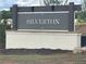 Silverton community sign made of stone and brick at the entrance of the neighborhood at 167 Silverton Dr, Dacula, GA 30019