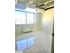 Bright bedroom with tiled floors and a view of the city at 2479 Peachtree Ne Rd # 1115, Atlanta, GA 30305