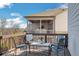 Relaxing back deck with outdoor seating, perfect for enjoying the outdoors and entertaining guests at 5345 Coltman Dr, Cumming, GA 30028