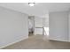 Upstairs hallway near a bedroom with plush carpet and neutral colors at 5345 Coltman Dr, Cumming, GA 30028