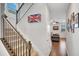 Welcoming foyer with staircase, hardwood floors, and view into the living room at 5345 Coltman Dr, Cumming, GA 30028