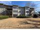 Exterior of the home showcasing the yard and balconies at 601 Park Ridge Cir, Marietta, GA 30068