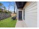 Inviting front entrance with gray siding, a dark door, and well-maintained landscaping at 601 Park Ridge Cir, Marietta, GA 30068