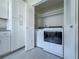 Laundry room with a washer and dryer plus storage cabinets at 601 Park Ridge Cir, Marietta, GA 30068