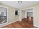 Bright living room featuring hardwood floors, light-colored walls, and abundant natural light at 601 Park Ridge Cir, Marietta, GA 30068