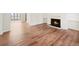 Cozy living room with hardwood floors and a fireplace, creating a warm ambiance at 601 Park Ridge Cir, Marietta, GA 30068