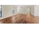 Open floor plan living room with large windows and hardwood floors throughout at 601 Park Ridge Cir, Marietta, GA 30068